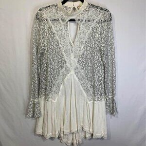 FREE PEOPLE stunning!!!! tunic/dress. Lace detail. Gorgeous cut outs. Size small